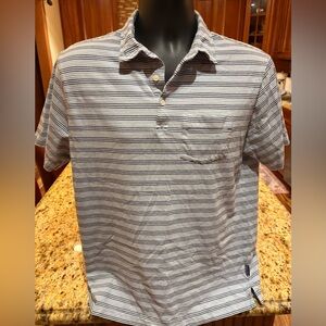 Patagonia Men's‎ organic cotton polo. Sharp grey/black striped with logo. Medium